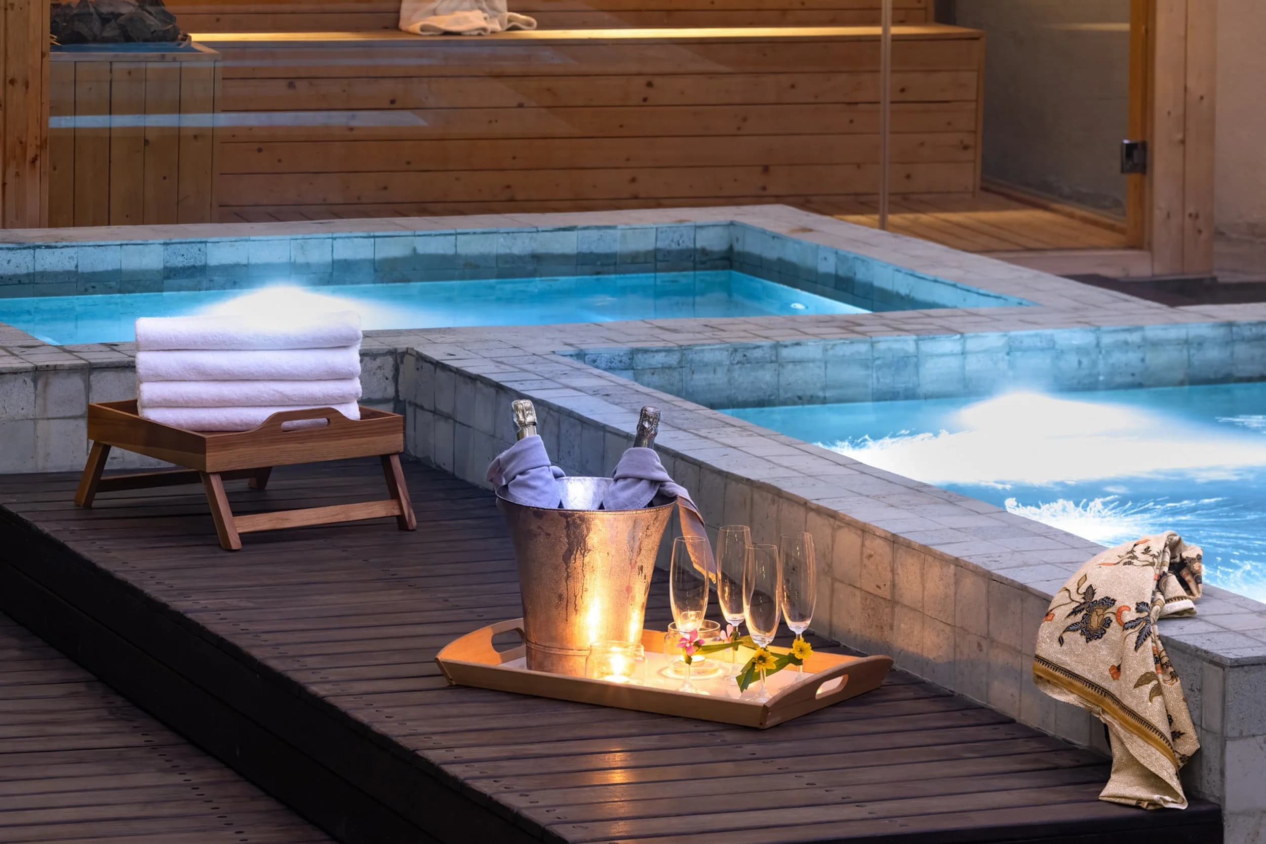 Jacuzzi and plunge pools beside the sauna in the evening at Umalas Creek