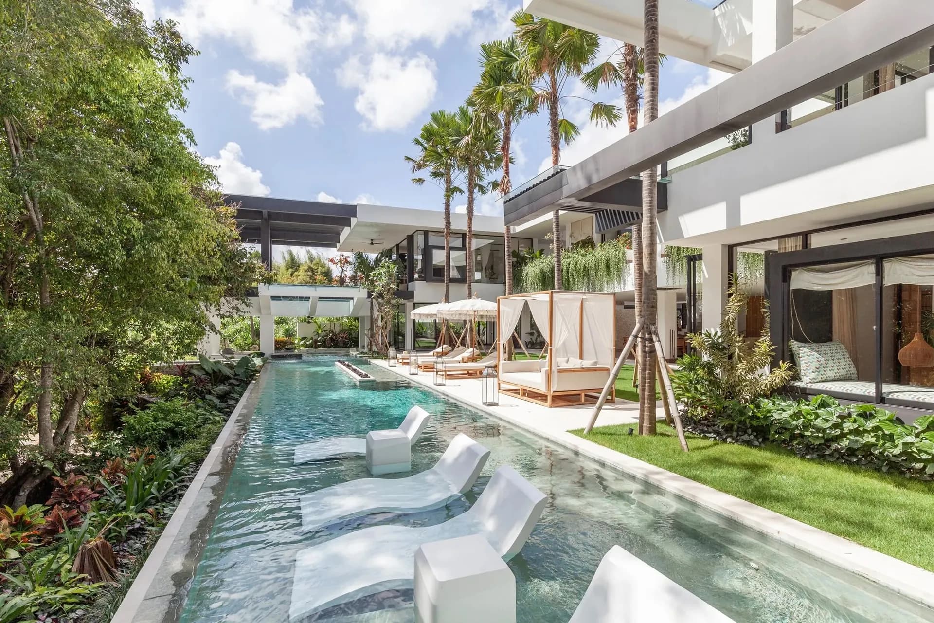 Luxury villa with private lap pool surrounded by tropical gardens in Bali